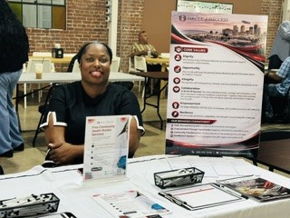 Sircle of Success Community Health Worker services table at a community event